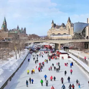 People skating on a frozen canal