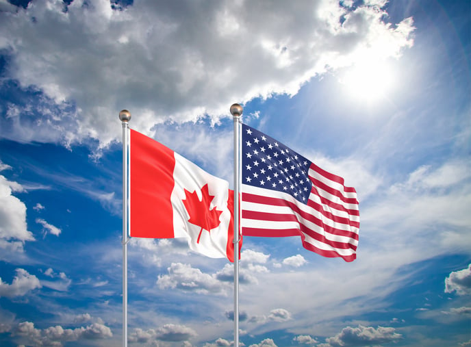 USA and Canada. Waving flags of America and Canada.