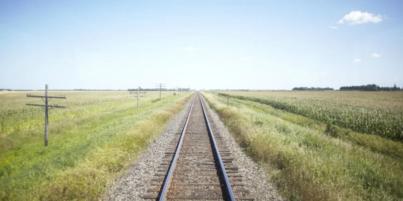 Endless railway through open fields