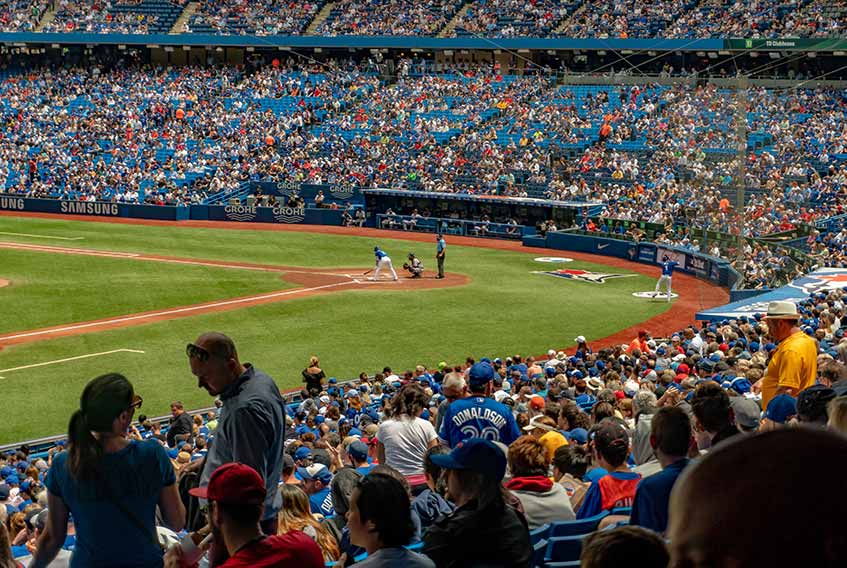 Crowded stadium at Blue Jays baseball game at Rogers Centre in Toronto