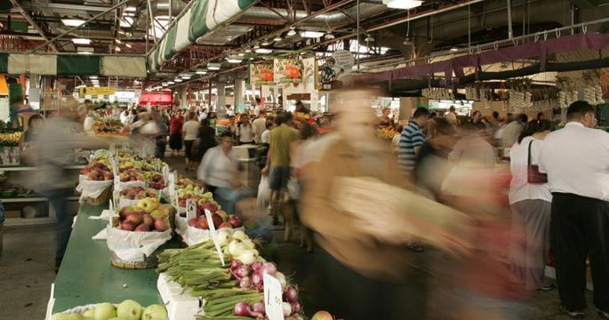 People grocery shopping in Montreal at the Jean-Talon Market