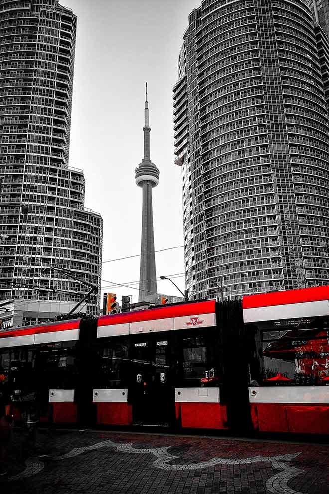 Toronto streetcar in front of CN Tower