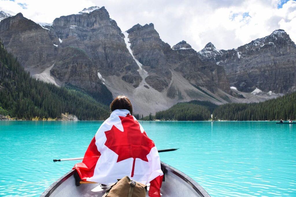 Traveller on a canoe in Banff, Canada.