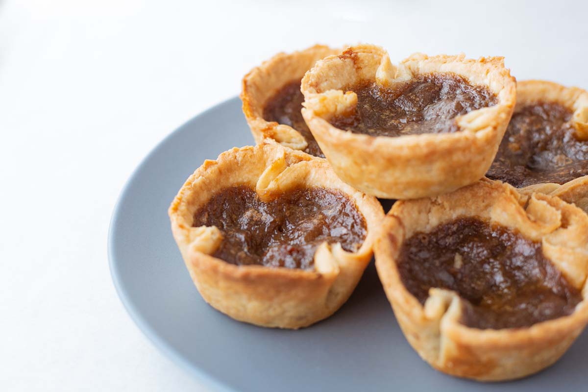 Butter tarts on a plate