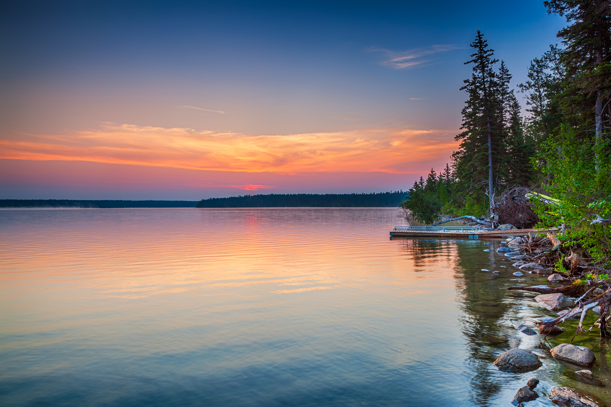 Gorgeous sunrise over Clear Lake in Riding Mountain National Park, Manitoba Canada