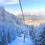 Ski lift on snowy mountain