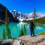 Woman overlooks lake in Alberta