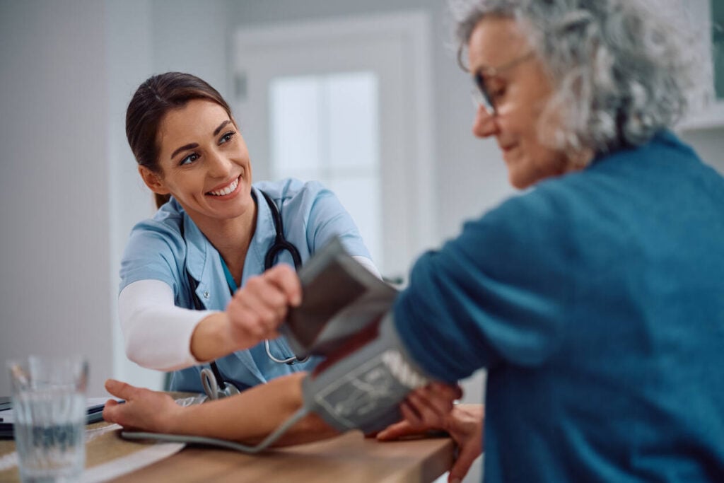 Nurse helping a patient