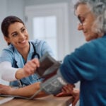 Nurse helping a patient